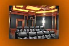 Home theater with two rows of black leather recliners, cherry wood paneling and a lit tray ceiling