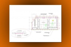 Home theater section with a floor construction detail of acoustic mat under plywood, and a note allowing for acoustic material on the columns