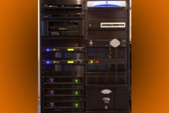 Front of the equipment rack: Meridian processor and QSC amplifiers